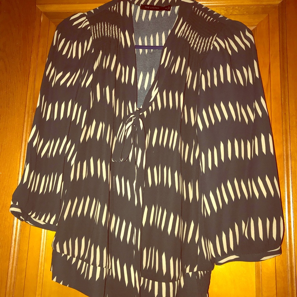 Limited black with tan tie neck 3/4 sleeve,size XS